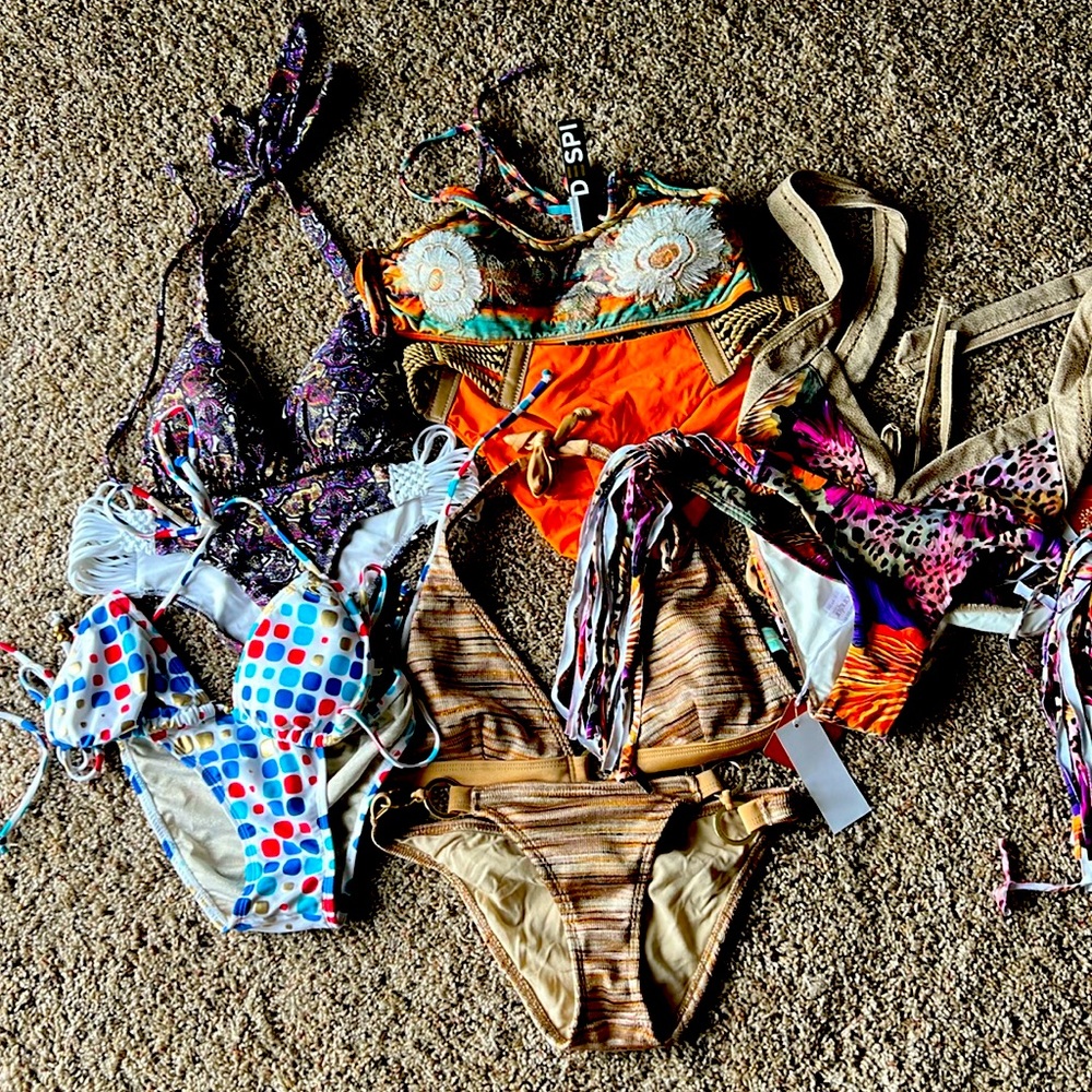 5 bikinis. 2 with tags 3 like new